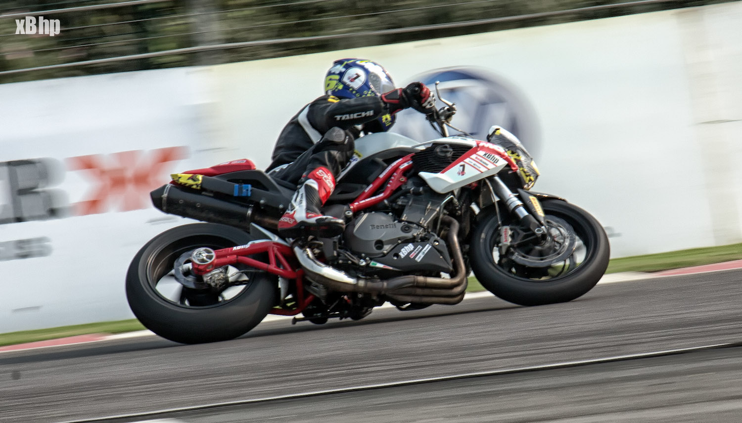 Benelli TNT R 1130 leaning on Buddh International Circuit turn 5 land hander